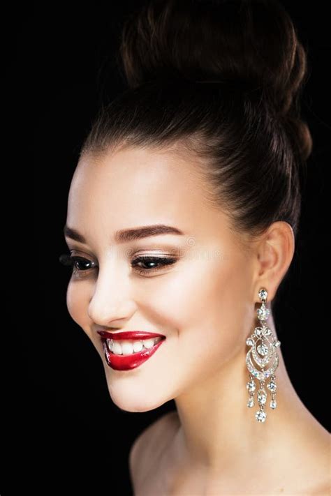 Beautiful Brunette Woman With Bright Make Up And Jewelry Earrings Smiling Close Up Red Lips And