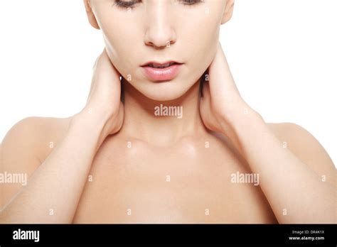 Naked Woman Touching Her Neck Head And Shoulders Close Up Over White Background Stock Photo