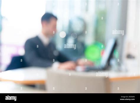 Blurred Office Background Office Worker On The Computer Stock Photo