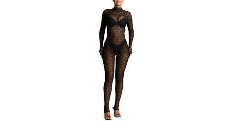 Naked Wardrobe Sheer Lace Long Sleeve Stirrup Jumpsuit In Black Lyst