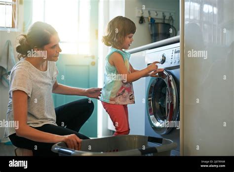 She Knows Which Buttons To Press Shot Of A Mother And Daughter Using A