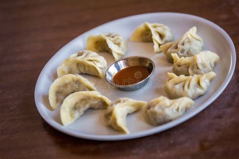 A Plate of Momo, the South Asian or Tibetan Style Dumpling Stock Photo ...