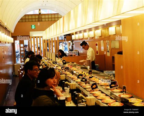 Traditional Revolving Sushi restaurant in Osaka, Japan Stock Photo - Alamy