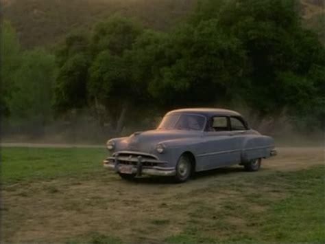 IMCDb.org: 1949 Pontiac Chieftain in "Dark Skies, 1996-1997"