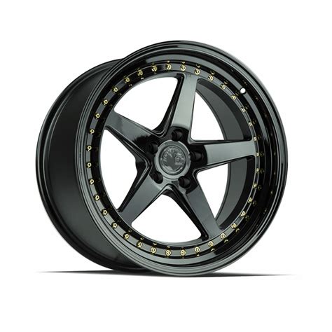 AodHan DS05 18x8 5 35 5x100 73 1 Gloss Black With Gold Rivets