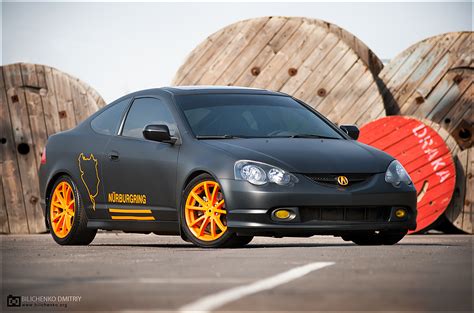 murdered out cars: Flat Black Acura RSX With Orange Wheels