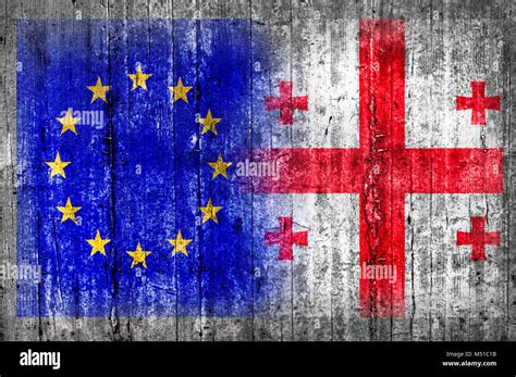 Eu And Georgia Flag On Concrete Wall Stock Photo Alamy