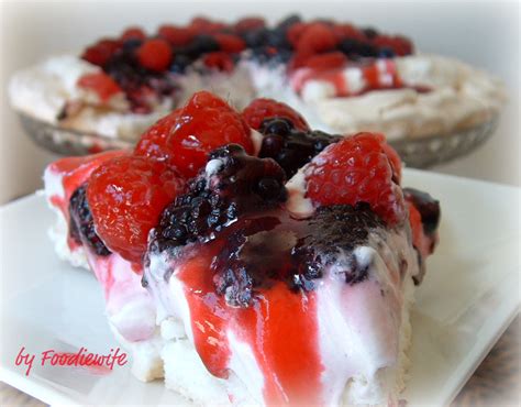 A Feast For The Eyes Summer Berry Pavlova With A Raspberry Coulis Sauce