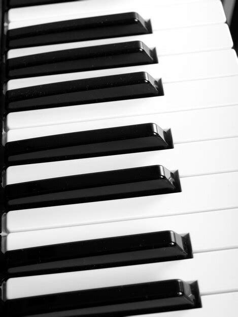 Premium Photo Black And White Keys On Music Keyboard