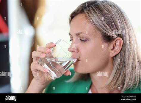 Thirsty Woman Drinking Water From Transparent Glass Stock Photo Alamy