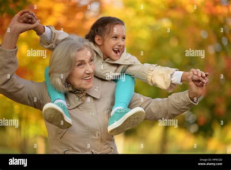 Portrait Of Happy Grandmother And Granddaughter Stock Photo Alamy