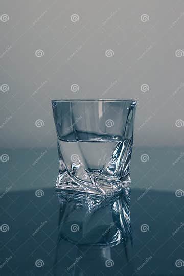 Clean Water in a Non-standard Glass Stock Photo - Image of stemware ...