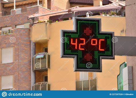 Street Thermometer Showing High Temperature Stock Photo CartoonDealer