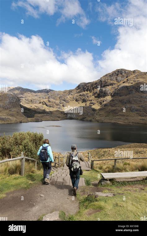 El Cajas National Park Ecuador A Tourist And Guide Walking In The