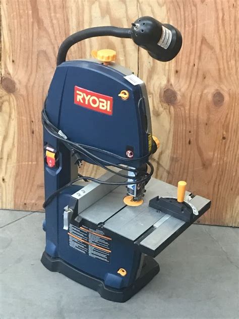 Ryobi Bench Top Bandsaw With Work L Loretto Equipment 363 K Bid