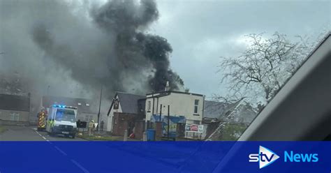 Smoke Billows From Pub As Firefighters Tackle Morning Blaze At The