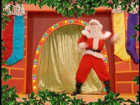 Santa Clause Doing A Dance Yule Be Wiggling - The Wiggles Christmas ...