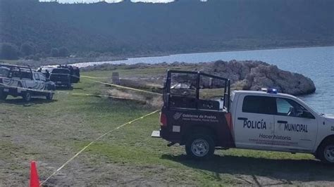 Tragedia en laguna de Puebla hija resbala papás tratan de rescatarla