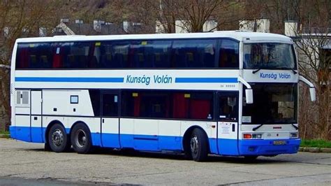 A Blue And White Double Decker Bus Parked On The Street