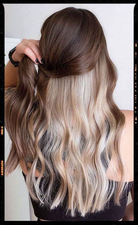 Hair Color Idea Walnut Brown With Peek A Boo Blonde Hair Inspo Color