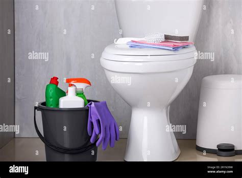 Bucket With Toilet Cleaning Supplies On Floor Indoors Stock Photo Alamy