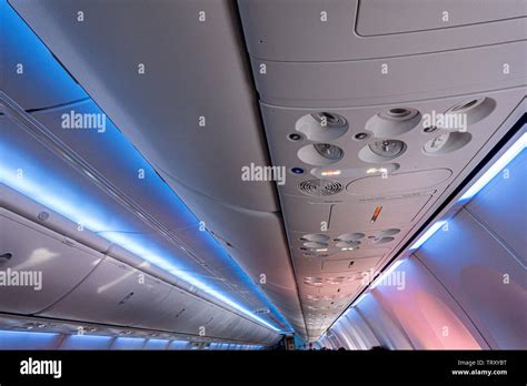 Overhead Ceiling Panels With Lighting And Air Conditioning Controls On A Boeing 737 Aircraft On