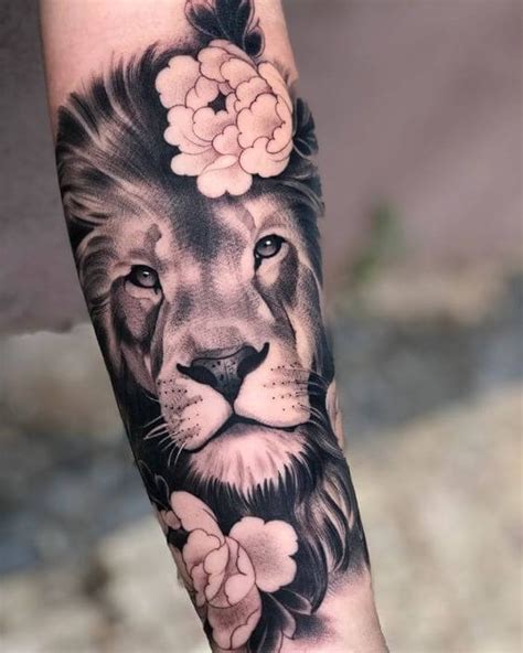 15 Best Lion And Flowers Tattoo Designs Petpress Lion Head Tattoos