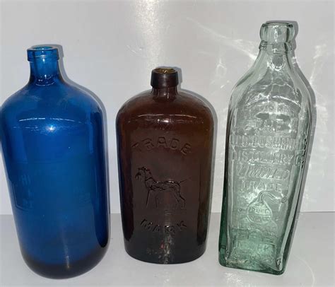 At Auction Antique Glass Bottles