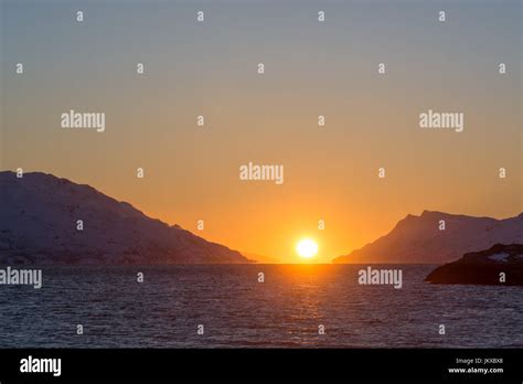 sunset midnight arctic finnmark norway Stock Photo - Alamy