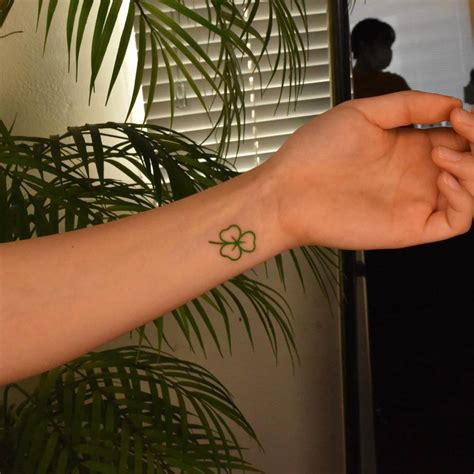 Minimalistic Four Leaf Clover Tattoo On The Wrist