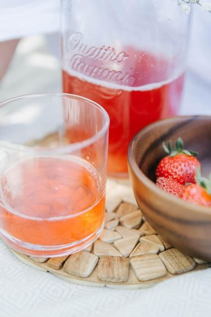 Premium Photo Glass Of Lemonade And Strawberries