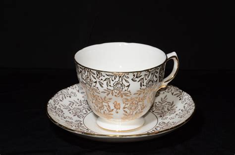 Royal Malvern Gold Chintz Genuine Bone China Teacup And Saucer Set