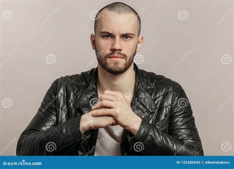 Close Up Portrait Of Angry Handsome Strong Man Preparing His Fists To