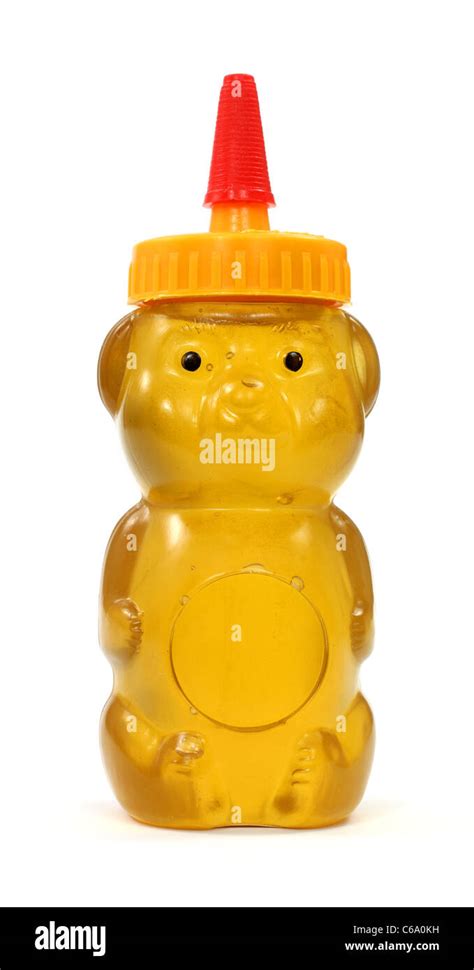 Honey in plastic bear container Stock Photo - Alamy