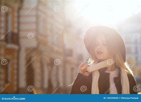 Outdoor Portrait Of Stunning Blonde Girl Wearing Hat Scarf And Stock