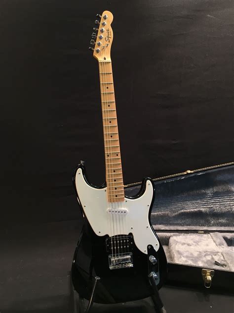 Squier By Fender Offset Jazzstrat Style Electric Guitar With Humbucker Pickup And Two Single