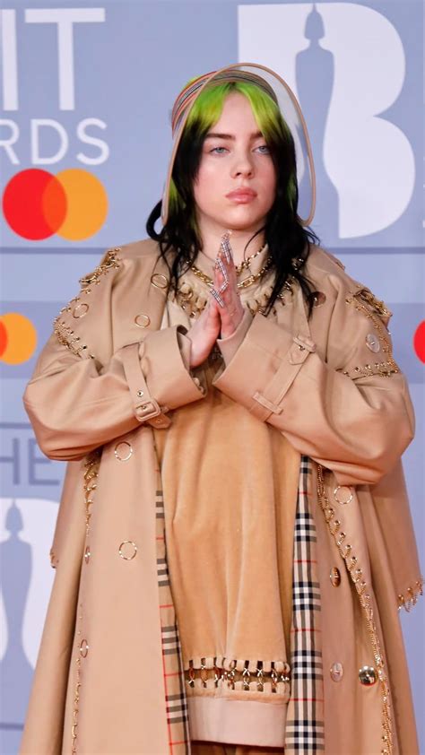 Billie Eilish Poses On The Red Carpet On Arrival For The Brit Awards