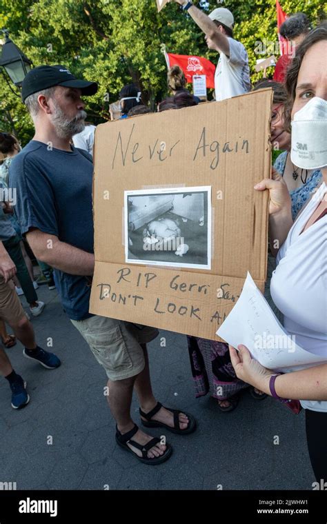 The Protesters Holding Cardboard Signs After Supreme Court Overturned