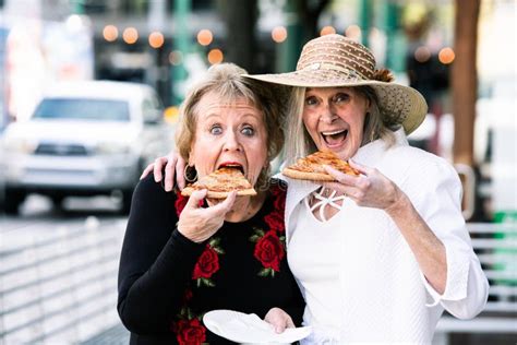 Senior Women Taking Big Bites Of Pizza Stock Image Image Of Dinner