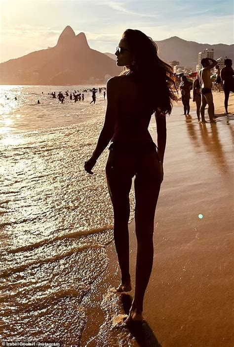 Izabel Goulart Shows Off Her Long Legs In Tiny Thong Bikini While