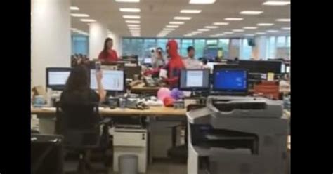 Video: Banker goes to work dressed as Spider-Man on his last day in office