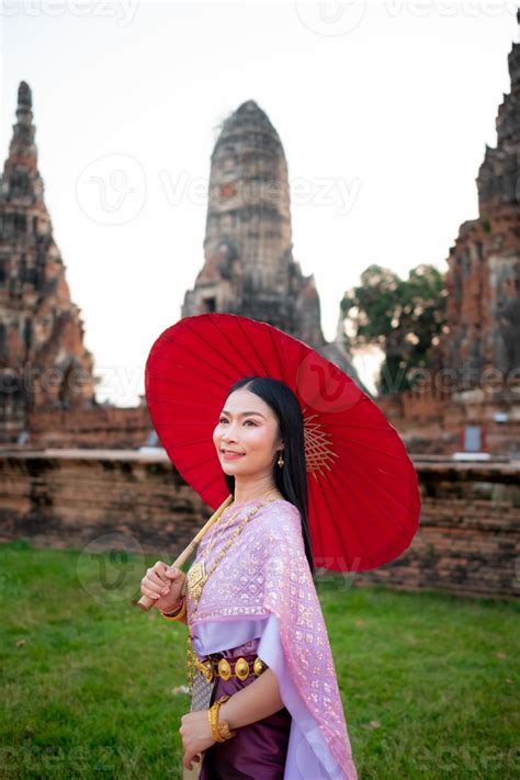 Beautiful Thai Girl In Traditional Dress Costume Red Umbrella As Thai