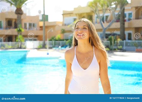 Close Up Of Beautiful Smiling Girl Standing In Swimsuit Next To