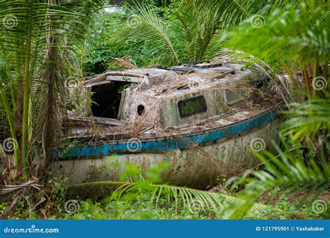 Wrecked And Weathered Hull Of An Abandoned Sailboat Royalty Free Stock