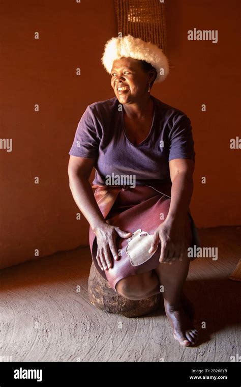 Basotho Woman In A Traditional Hut Thaba Bosiu Cultural Village