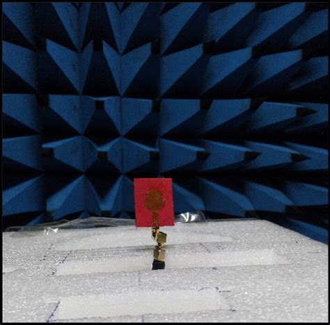 Photograph of anechoic chamber set up. An anechoic chamber is used to ...