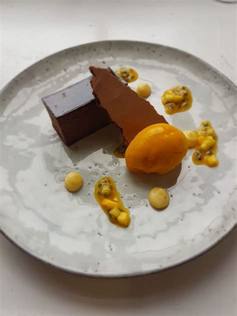 Chocolate Caramel Torte With Passionfruit Sorbet Lime Curd Dehydrated Chocolate Mousse And