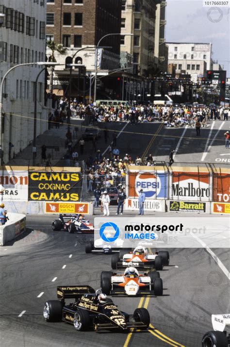 Nigel Mansell Lotus Ford Leads Mauro Baldi Alfa Romeo T