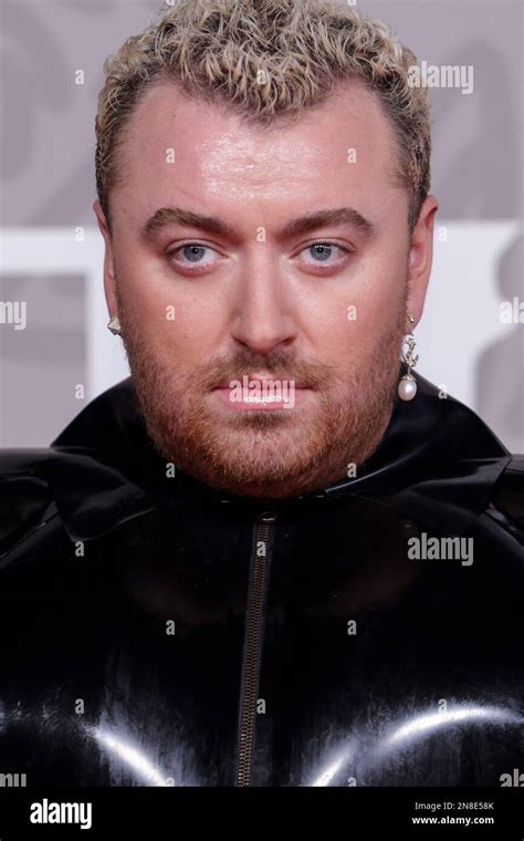 Sam Smith Poses For Photographers Upon Arrival At The Brit Awards 2023