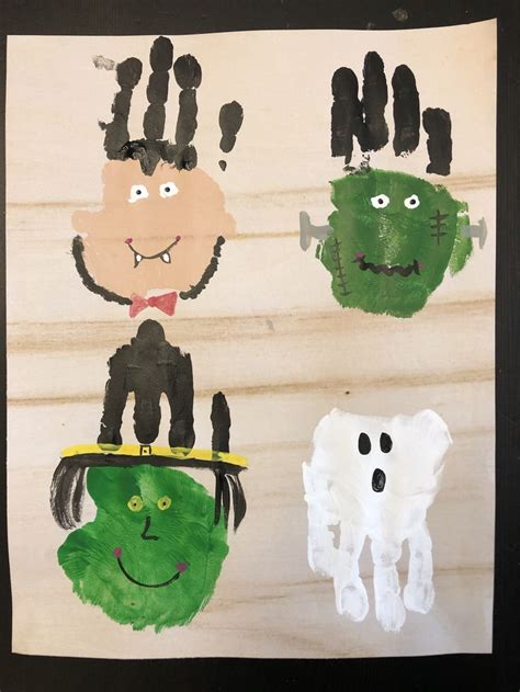 Halloween Hand And Foot Print Art Halloween Crafts For Toddlers